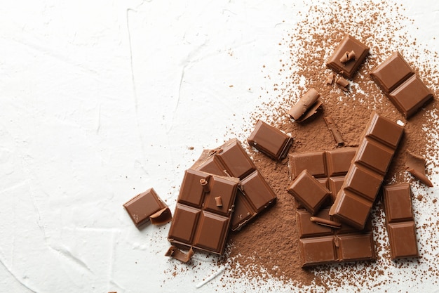 chocolate and powder on white background