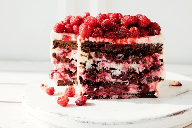 Chocolate raspberry cake inside cutaway filling macro shot 