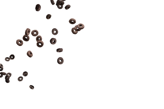 Chocolate rings cereal spill out into a bowl Breakfast