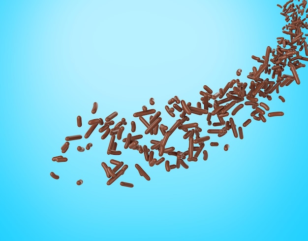 Photo chocolate sprinkles for cakes or meises coming in the air on blue background 3d illustration