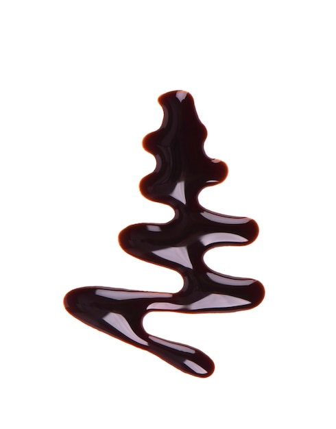 Chocolate syrup drop isolated on white space. Top view.