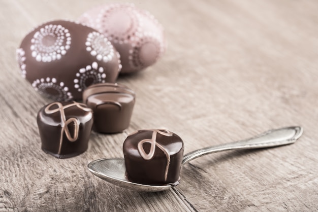 Chocolate truffles on a wooden table