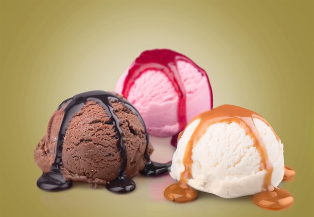 Chocolate, vanilla and strawberry ice cream on  background