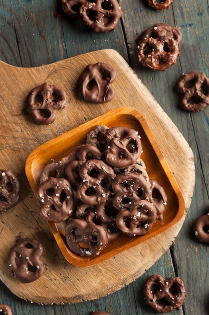 Chocolate with nuts on the wooden table