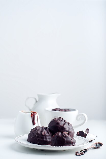 Chocolate  zephyr and cup of coffee 