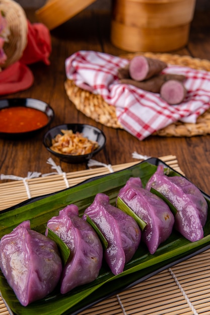 Choi pan steamed vegetable dumplings also known as Chai Kwe or Chai Kue is one of the many special traditional Asian delicacies and this Choi Pan is made from purple sweet potato