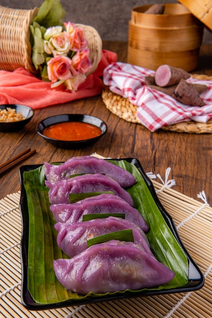 Choi pan steamed vegetable dumplings also known as Chai Kwe or Chai Kue is one of the many special traditional Asian delicacies and this Choi Pan is made from purple sweet potato