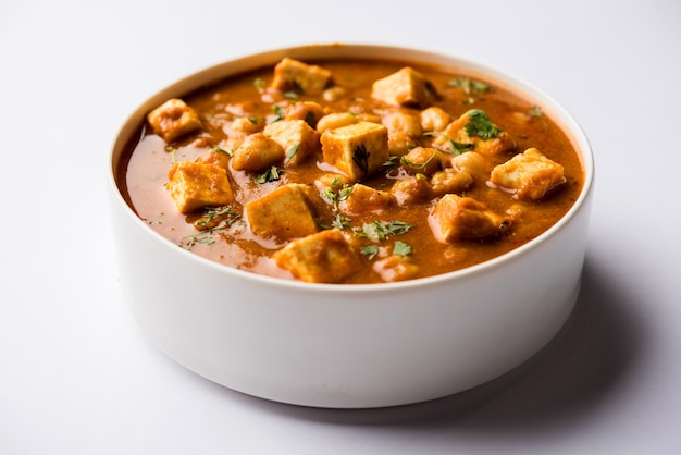 Chole Paneer curry made using boiled chickpea with cottage cheese with spices. Popular North Indian recipe. served in a bowl or serving pan. Selective focus