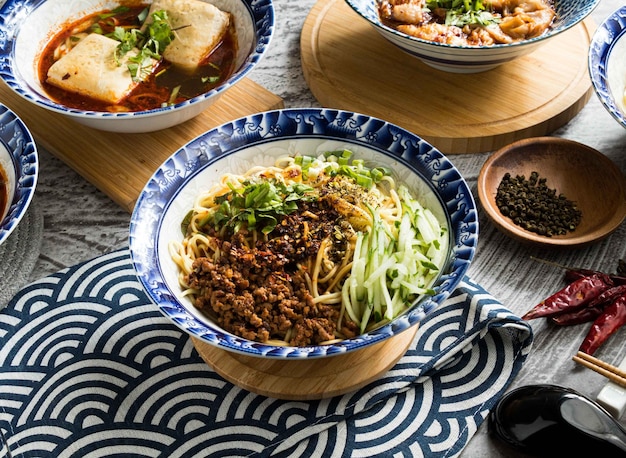 Chongqing spicy noodles served in dish isolated on napkin top view on table taiwan food