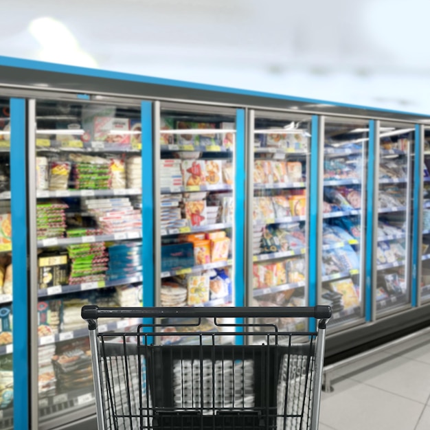 choosing a dairy products at supermarket empty grocery cart in an empty supermarket