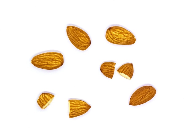 Photo chopped almonds layout on white background isolated