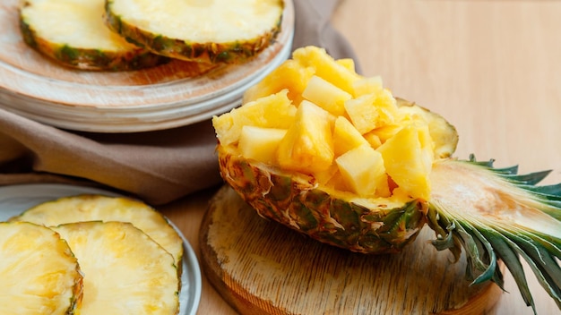 Chopped pineapple salad in half pineapple fresh delicious pineapple cut into pieces tasty summer