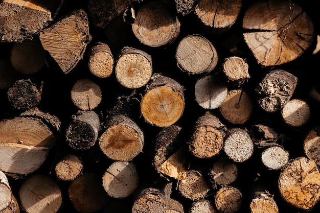 chopping firewood for heating stacked firewood preparation for winter