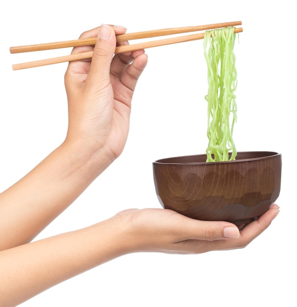 chopsticks holding Chinese vermicelli with bowl isolated on white background