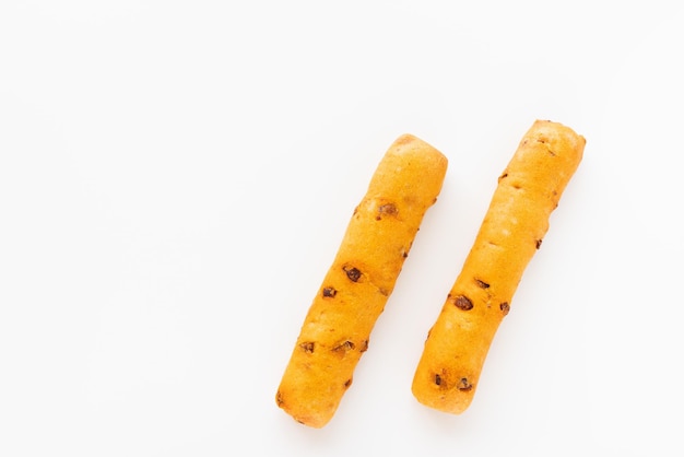 Chorizo breadsticks appetizer on white background copy space