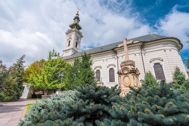 Christian orthodox church with domes and a cross against the sky