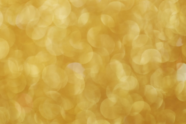 Christmas abstract gold bokeh background.