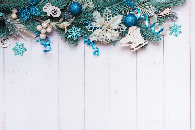 Christmas background made from pine tree berries and festive decorations top view Christmas flat lay