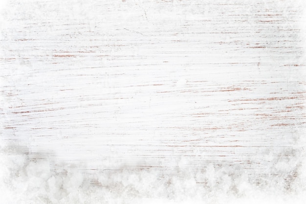 Christmas background - Old white wood texture with snow. top view, border design. vintage and rustic style