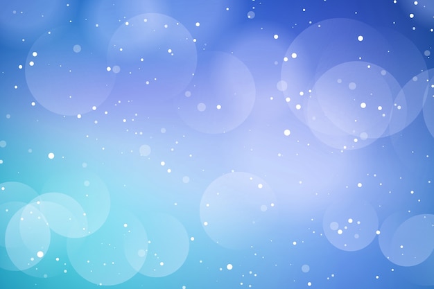 Christmas background with blue bokeh lights design