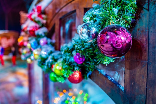 Christmas background with Christmas tree and lights. The light bulbs on the Christmas tree with beautiful celebration background