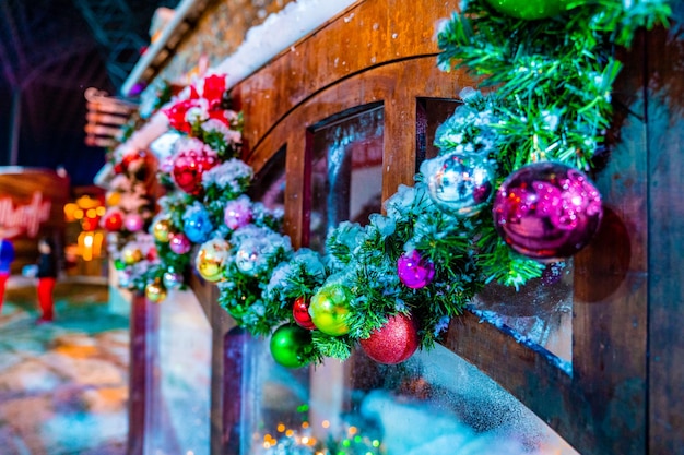 Christmas background with Christmas tree and lights. The light bulbs on the Christmas tree with beautiful celebration background