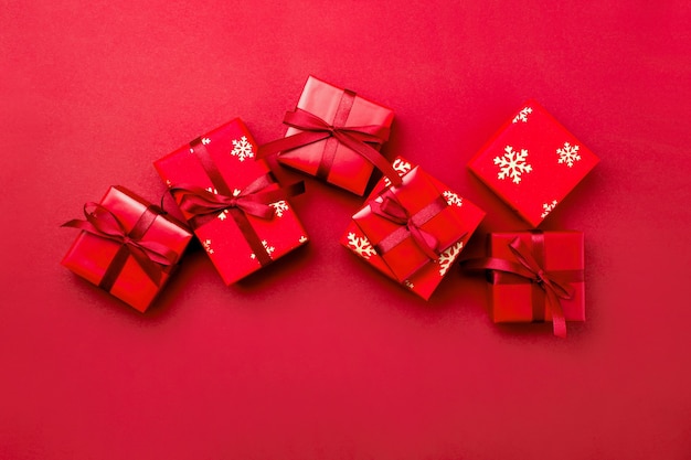 Christmas background with decorated gift boxes, top-down view