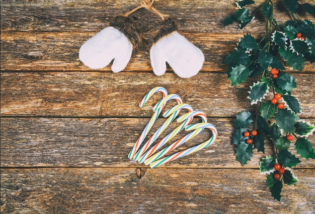 Christmas background with decorations and cookies wooden board