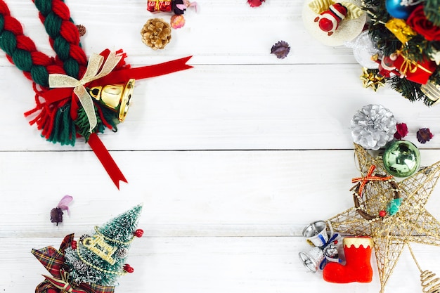 Christmas background with decorations and gift boxes on wooden