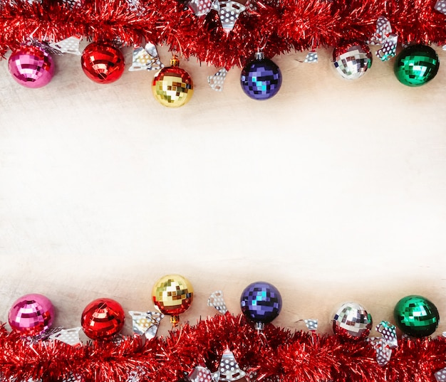 Christmas background with decorations on wooden board 