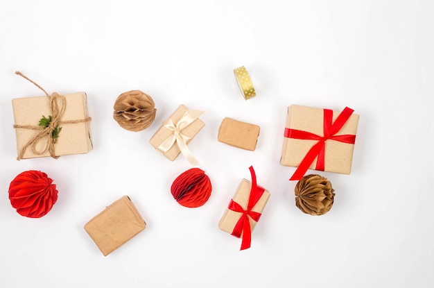 Christmas background with gift boxes red baubles and ribbon