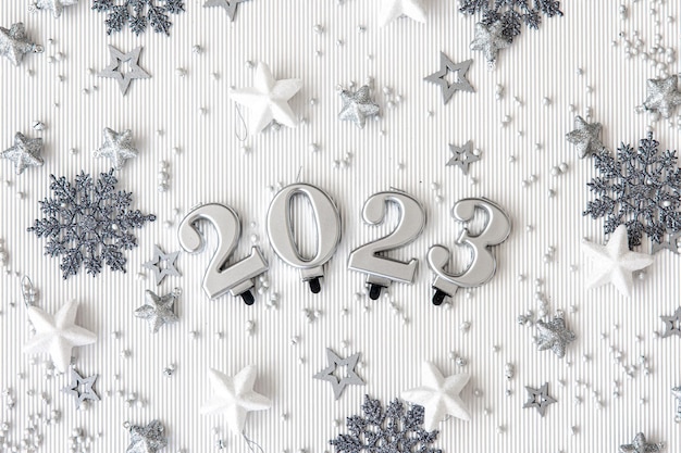 Christmas background with numbers 2023 on a white background