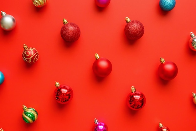 Christmas ball bauble pattern minimal flatlay on red background top view