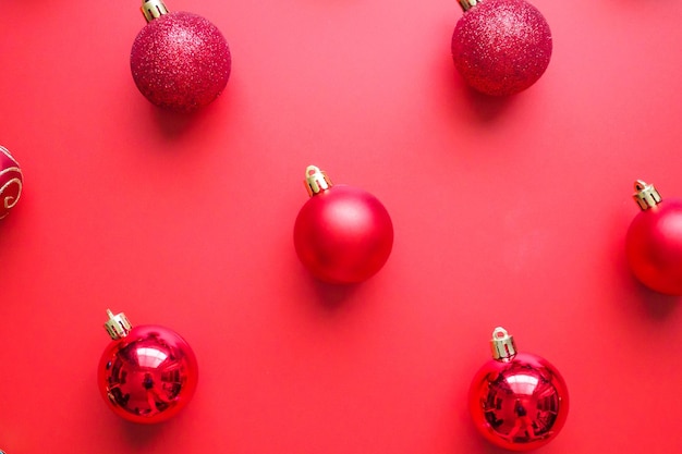 Christmas ball bauble pattern minimal flatlay on red background top view