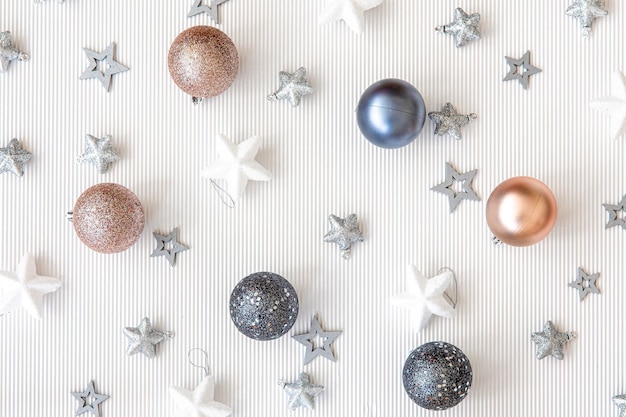 Christmas balls and decorative stars on a white background flat lay