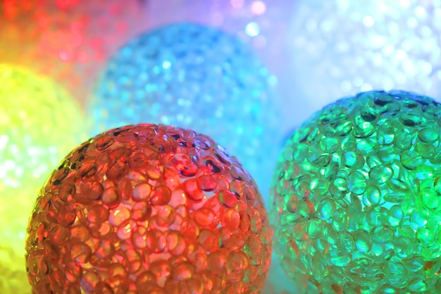 Christmas balls with lights background. Christmas evening. Happy New Year.