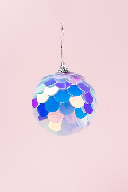 Christmas bauble in vibrant gradient holographic colors