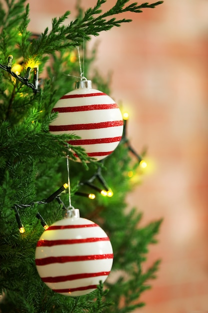 Christmas baubles on a fir tree branch