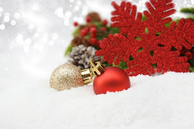 Christmas baubles in snow