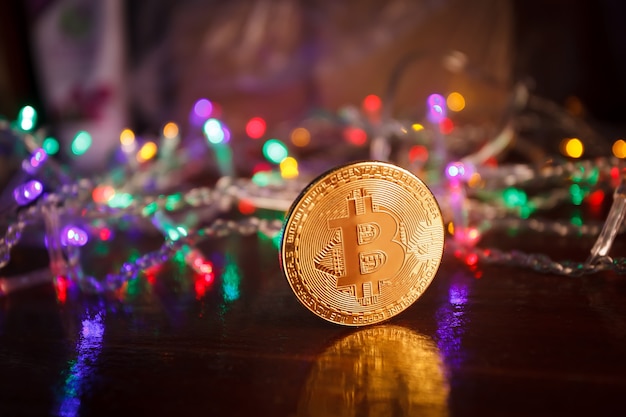 Christmas bitcoin garland gifts and fir branches