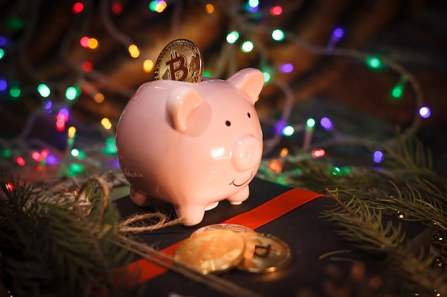 Christmas bitcoin garland gifts and fir branches