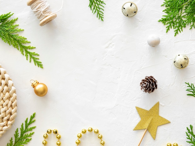 Christmas border frame with pine branches and christmas tree toys isolated on white top view copy