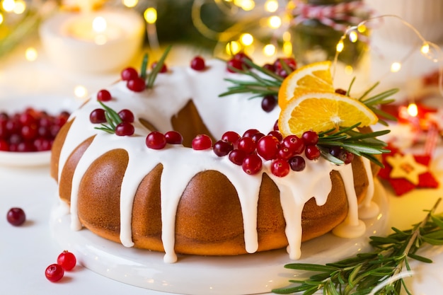 Christmas bundt cake decorated sugar icing and cranberries