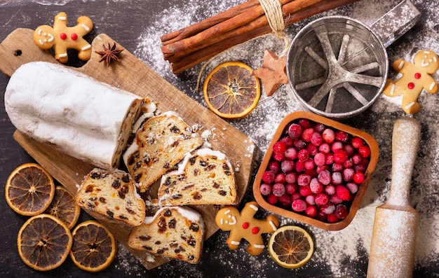 Christmas cake with ingredients for cooking. Christmas baking background, top view