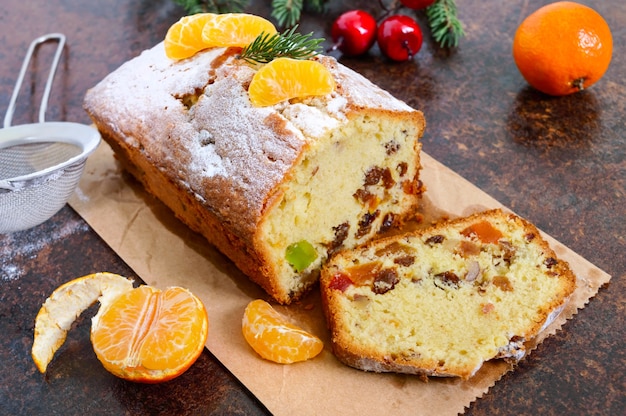 Christmas cake with tangerines top view