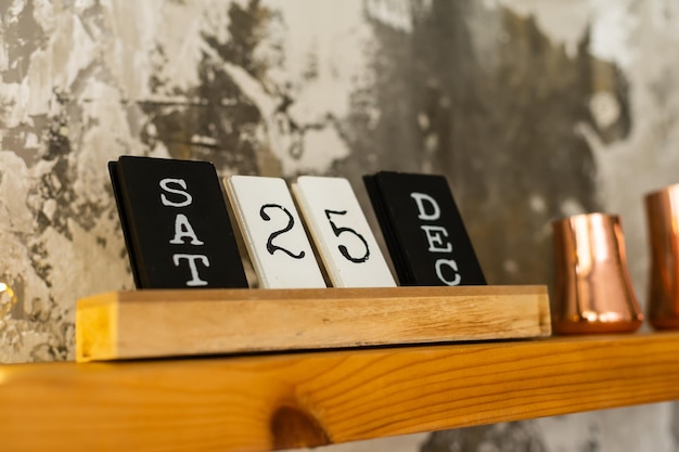 Christmas calendar with 25th December on wooden blocks