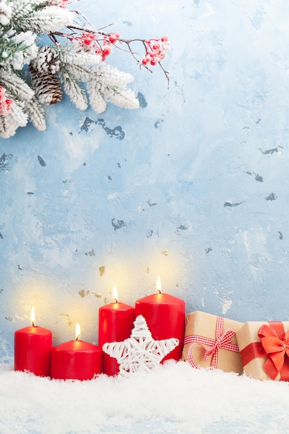 Christmas candles gifts and fir tree