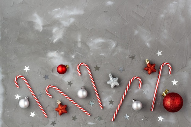 Christmas candy cane red and silver balls stars New year concept