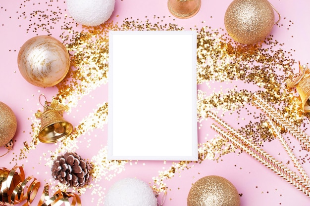 Christmas card with Christmas golden balls decor. Empty space. Flat lay style