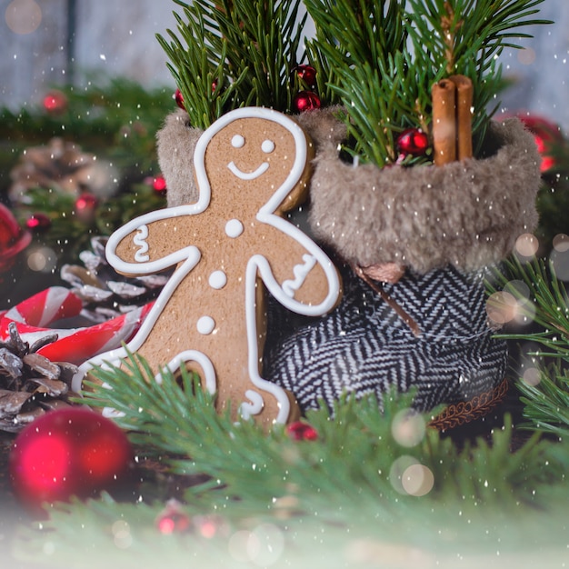 Christmas Card with Cookies Gingerbread man,holiday decoration and fir tree.